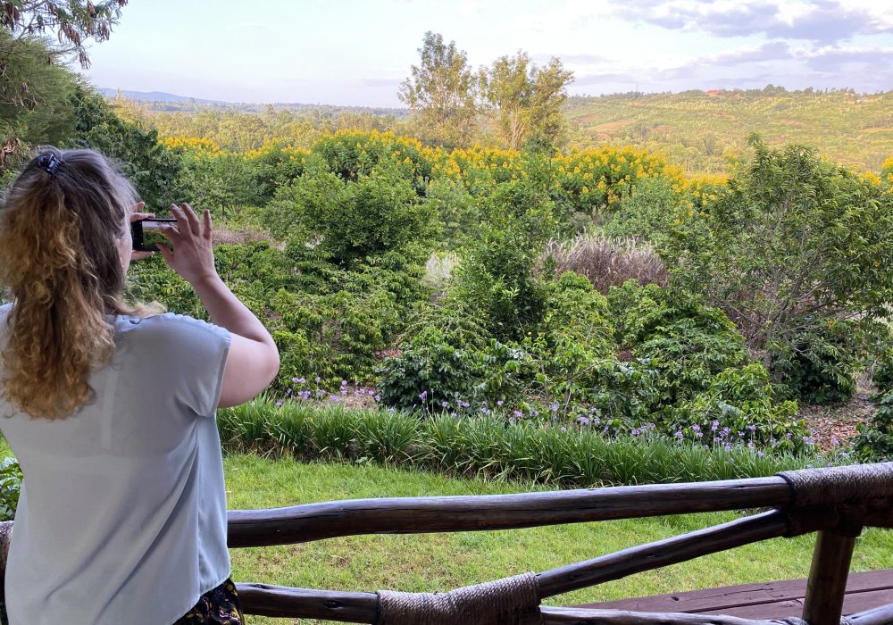 Taking a photo of the beautiful views from Rhotia Valley Lodge